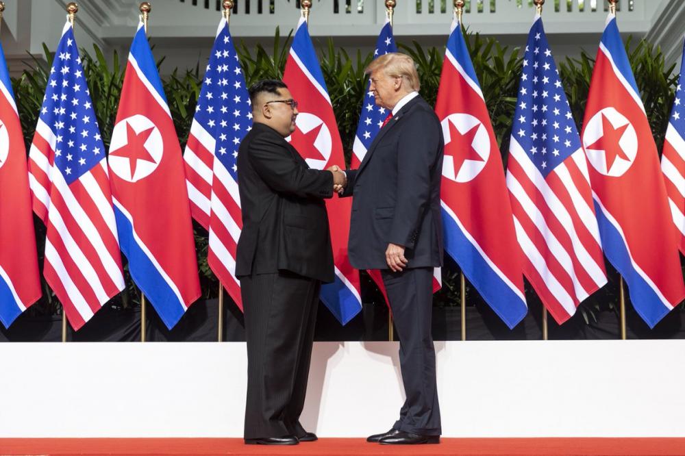 Donald Trump, Kim Jong Un shake hands, meet in Singapore
