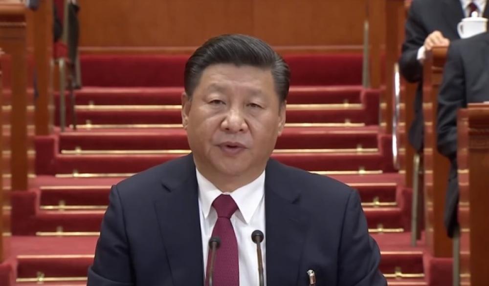 Xi extension: Critic says a farce in China