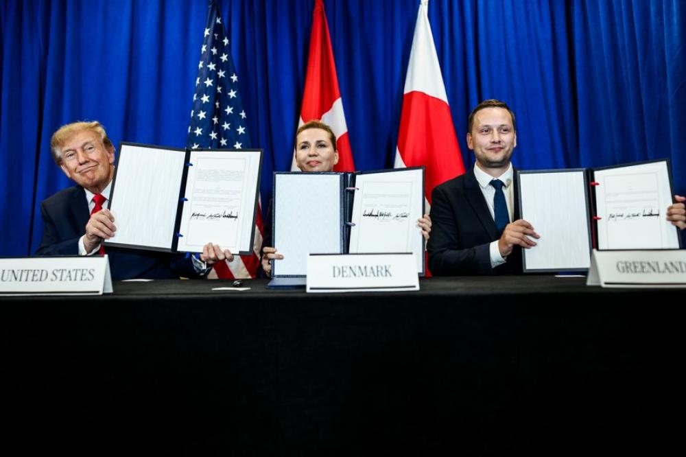 Trump signs Greenland security pact after months of tensions with Denmark 