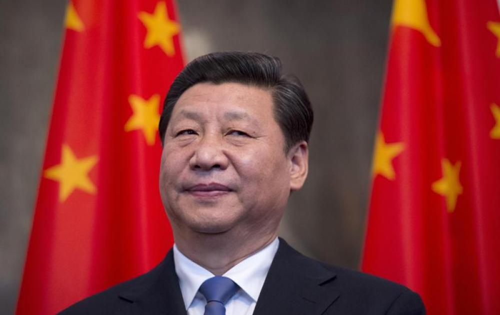 China to reduce tariffs, open up economy, Xi says at APEC forum