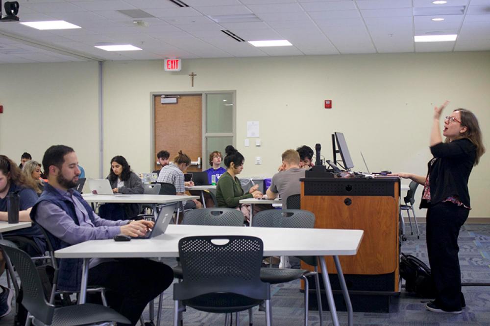 Master students listening to a class lecture on Artificial Intelligence in Saint Louis. Photo by Zach Calder.