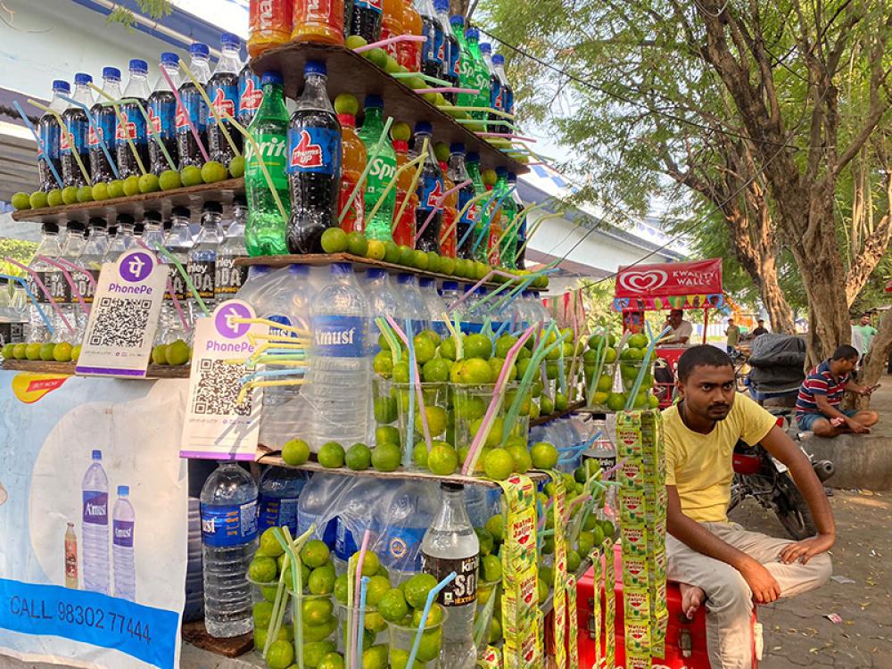 Sujay Mondal, a Soda Drink seller in the Science City area of India’s eastern city Kolkata, says UPI has helped him save money every month for future use. Photo by Avishek Mitra.