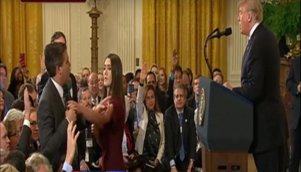 White House suspends CNN reporter's press pass for alleged 'inappropriate behaviour'