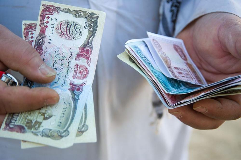 Afghanistan merchants say counterfeit Afghani bills turning up in capital Kabul