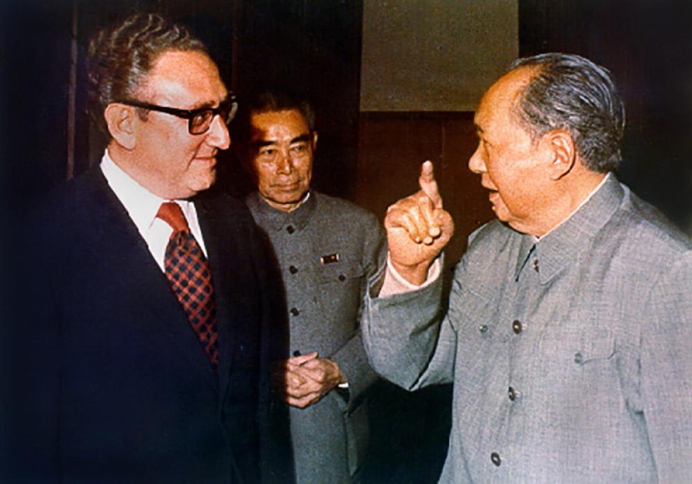 Kissinger, shown here with Zhou Enlai and Mao Zedong, negotiated rapprochement with China. Photo courtesy: Wikipedia/Creative Commons