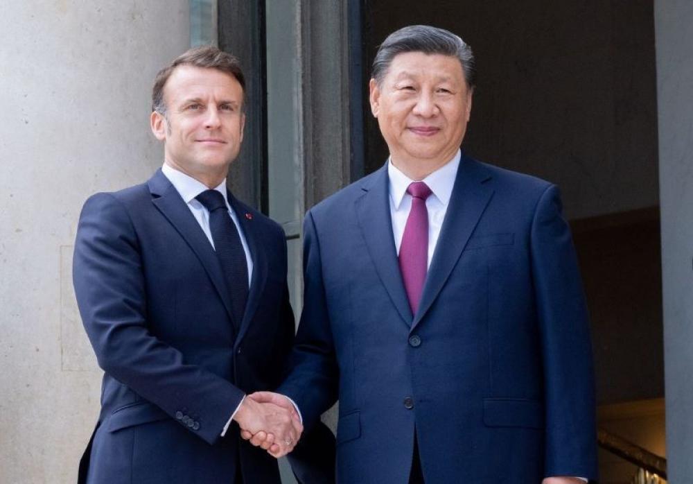 Campaigners for Tibet, Xinjiang protest in Paris as Xi Jinping visits France
