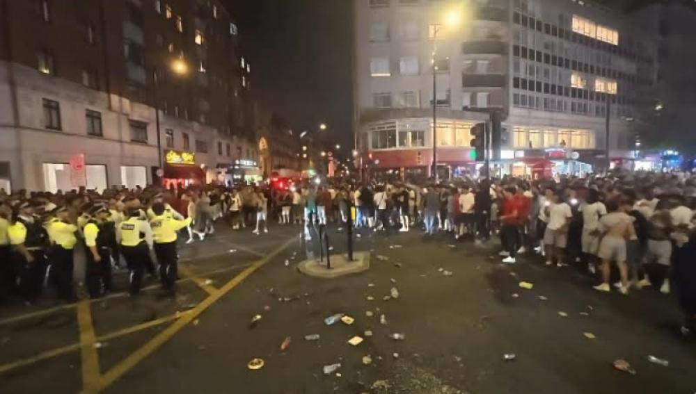 Morocco fans clash with riot police in London. Photo: Screen-grab from X