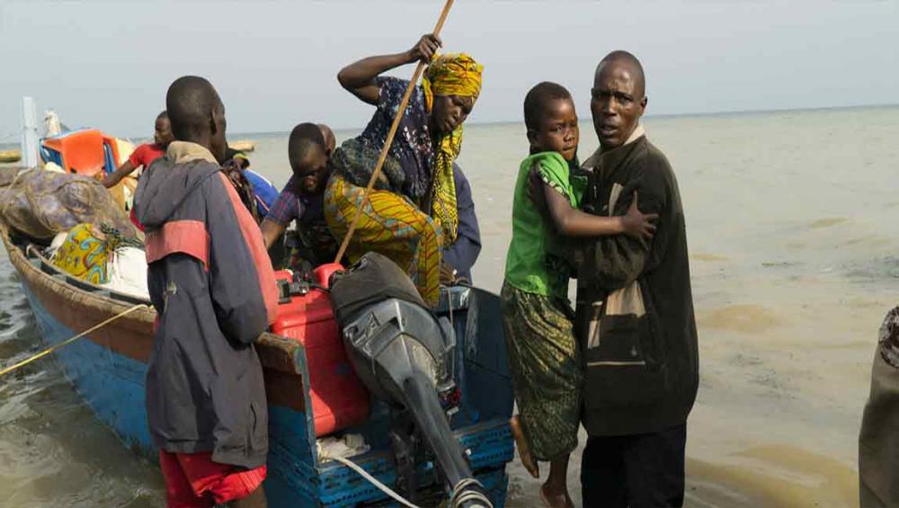 Fleeing DR Congo violence, thousands take perilous lake journey to Uganda – UN
