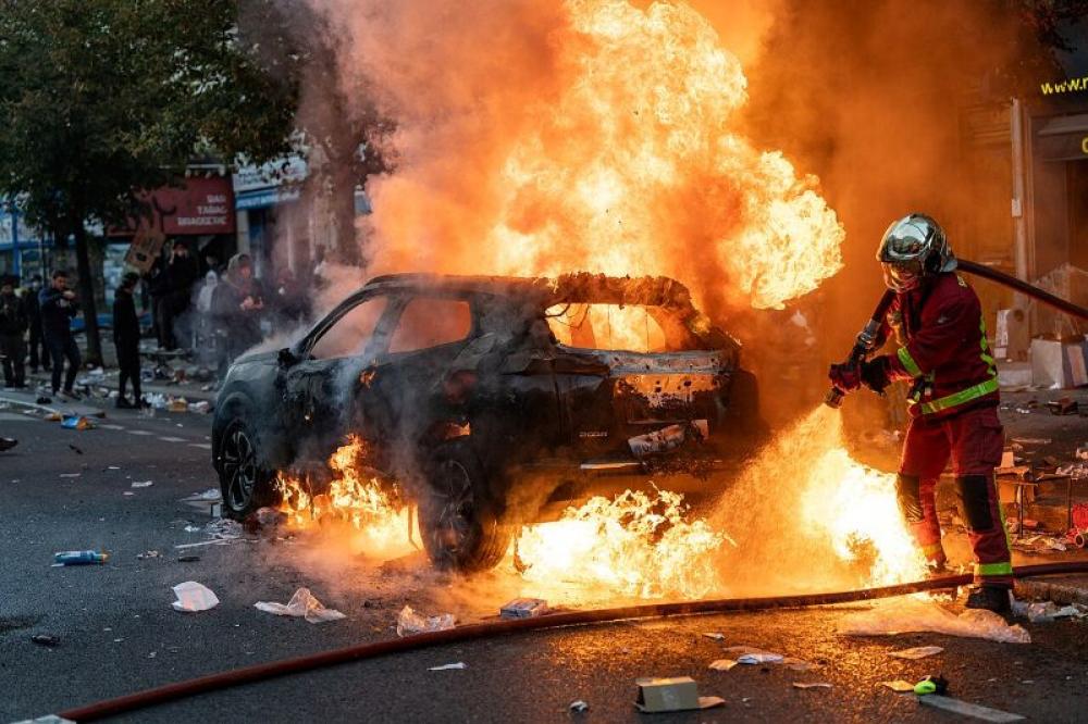 France's streets turn chaotic: Looting, fires and mass arrests follow protests