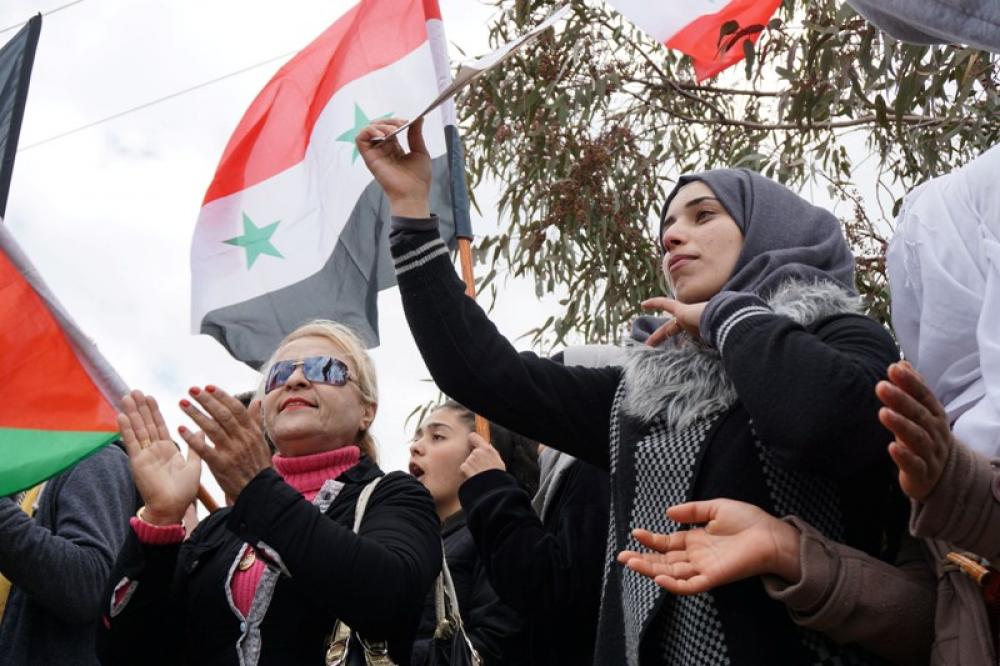 Syrians protest against US recognition of the Syrian Golan Heights as part of Israel