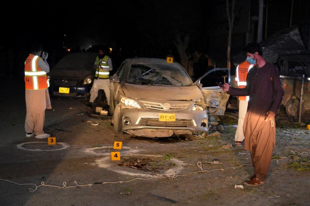 Security officials examine bomb blast in Quetta