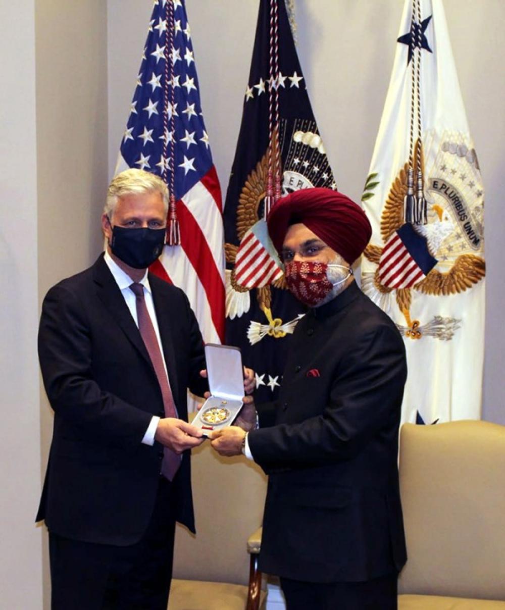 US President Donald Trump presents PM Modi with 
