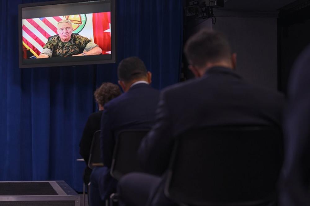 Kenneth McKenzie, commander of the U.S. Central Command, attends a Pentagon press briefing