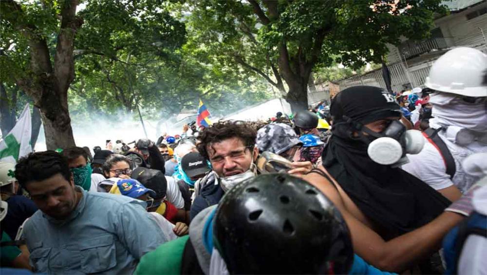 Venezuela: UN rights office urges all parties to refrain from violence amid protests over Sunday's elections
