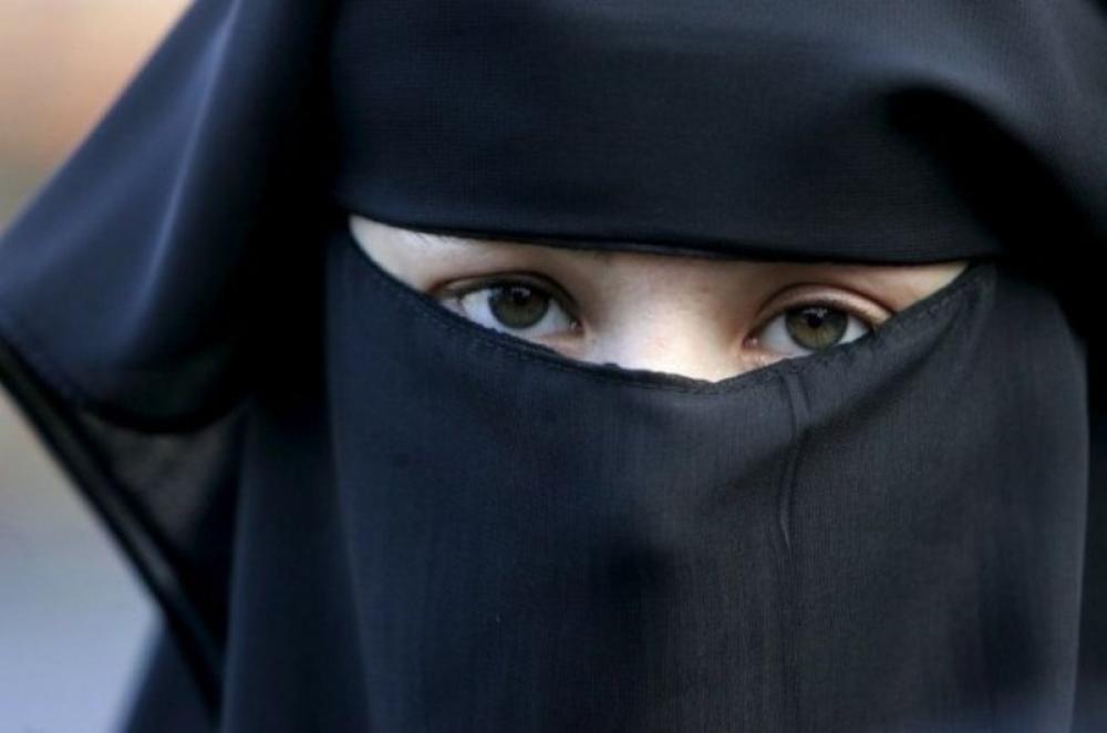 Quebec set to do away with face veil, triggers row