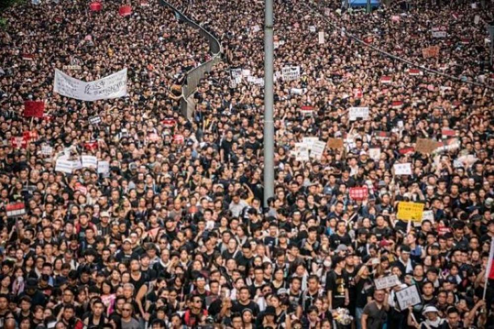 Thousands join largest pro-democracy rally in Hong Kong