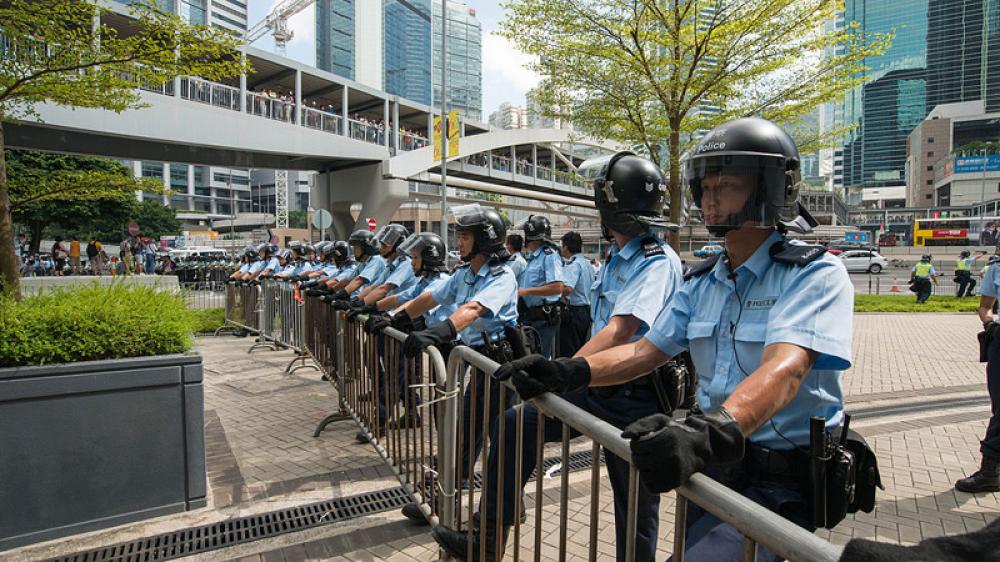 Hong Kong: Apple Daily announces closure days after police crackdown