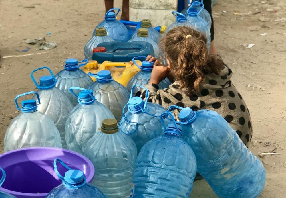 Israeli strike leaves ten people, including children, fetching water in Gaza Israeli strike leaves ten people, including children, fetching water in Gaza
