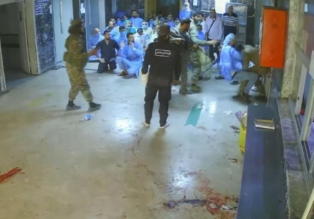 Chilling video shows hospital staff kneeling before gunmen in Syria, one of them executed Chilling video shows hospital staff kneeling before gunmen in Syria, one of them executed